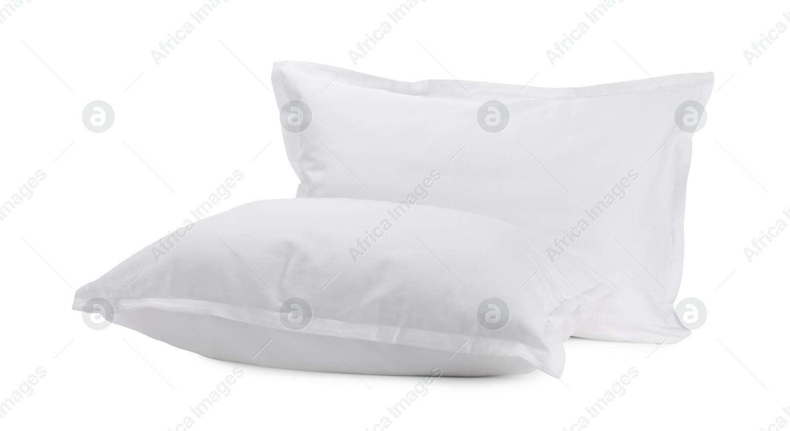 Photo of Two new soft pillows isolated on white