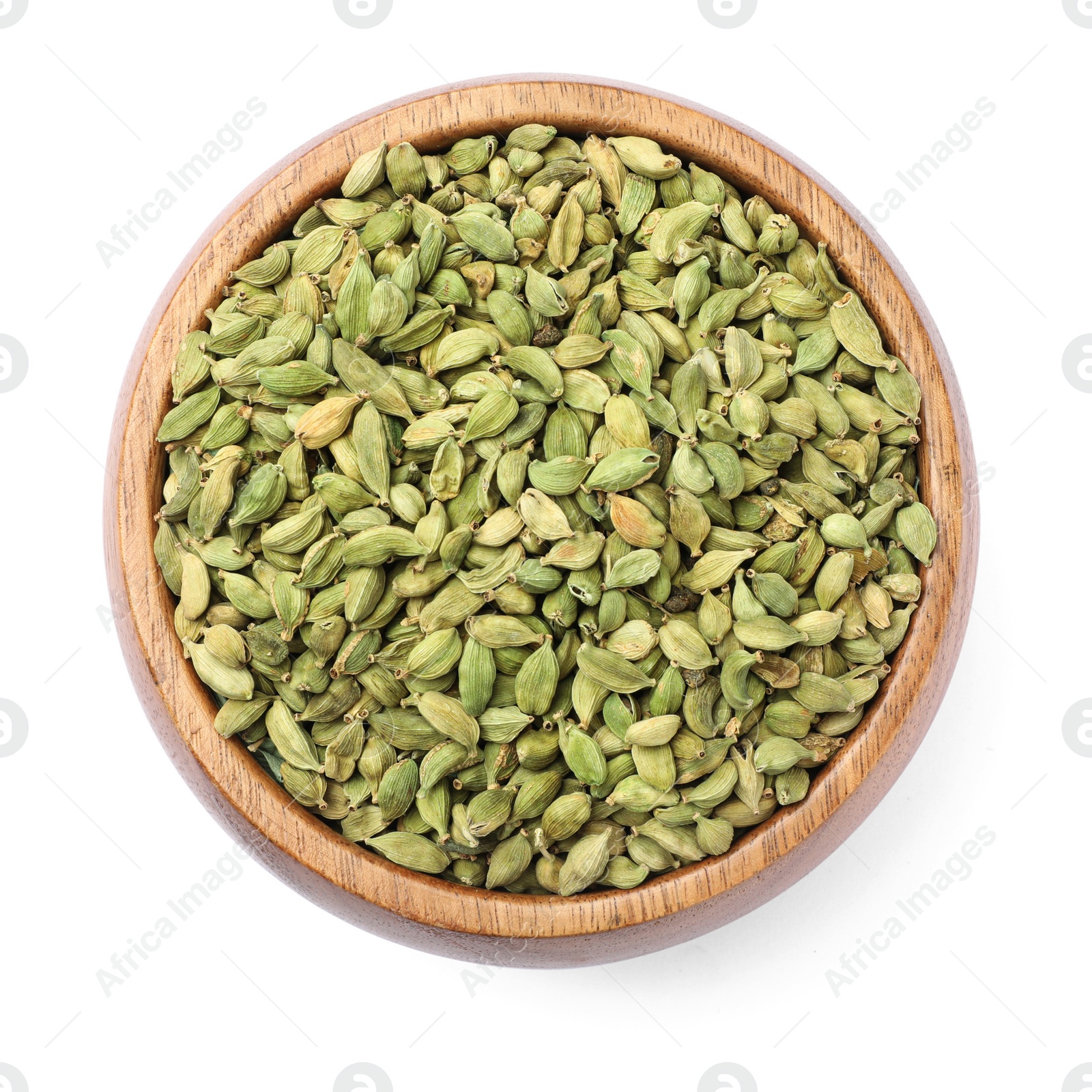 Photo of Wooden bowl with dry cardamom seeds isolated on white, top view