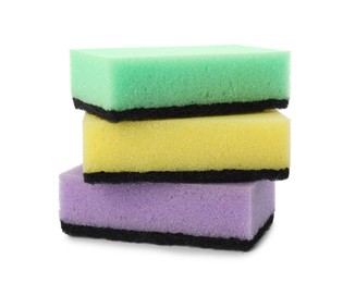 Bright cleaning sponges with abrasive scourers on white background