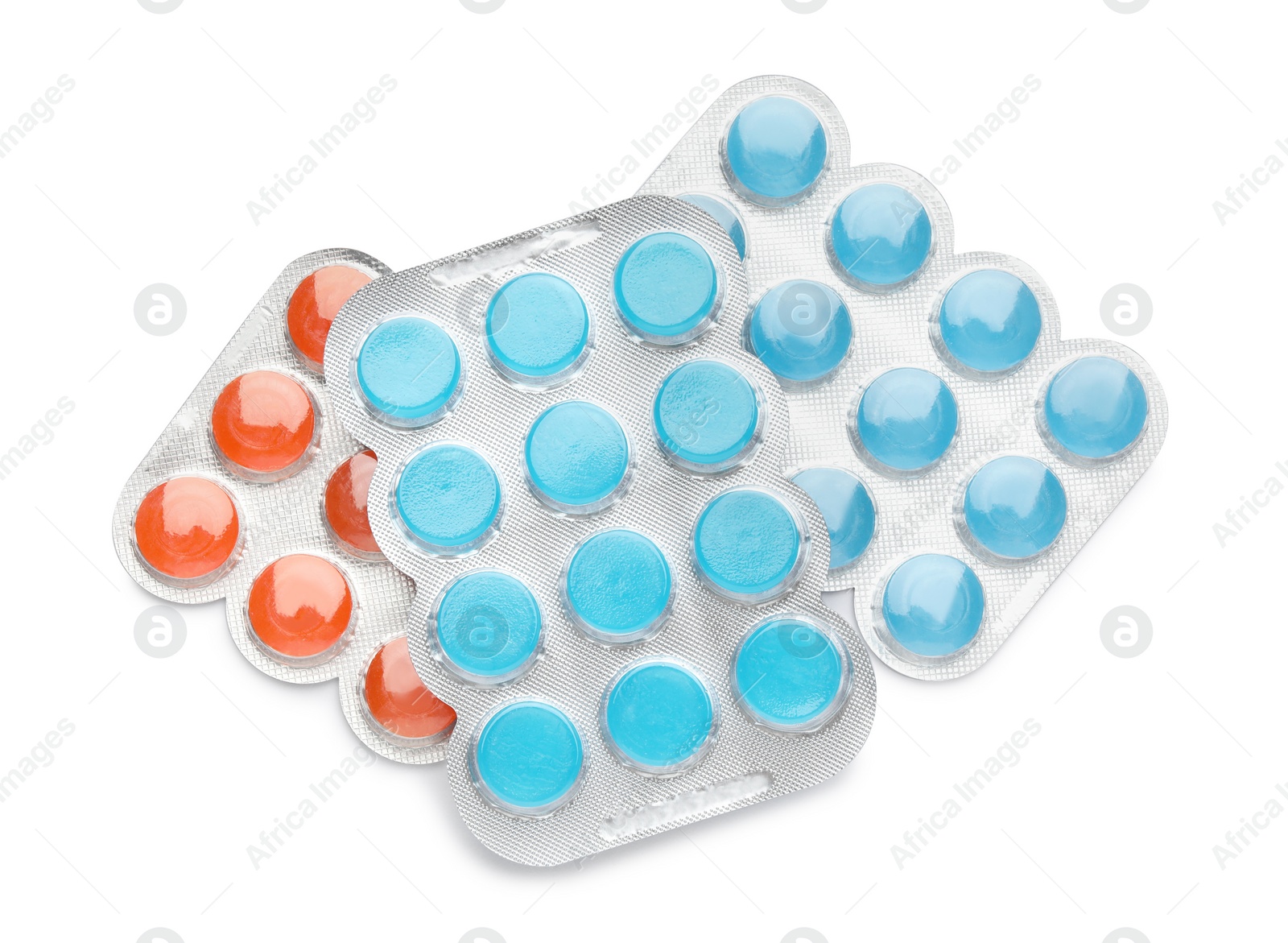 Photo of Blisters with colorful cough drops on white background, top view