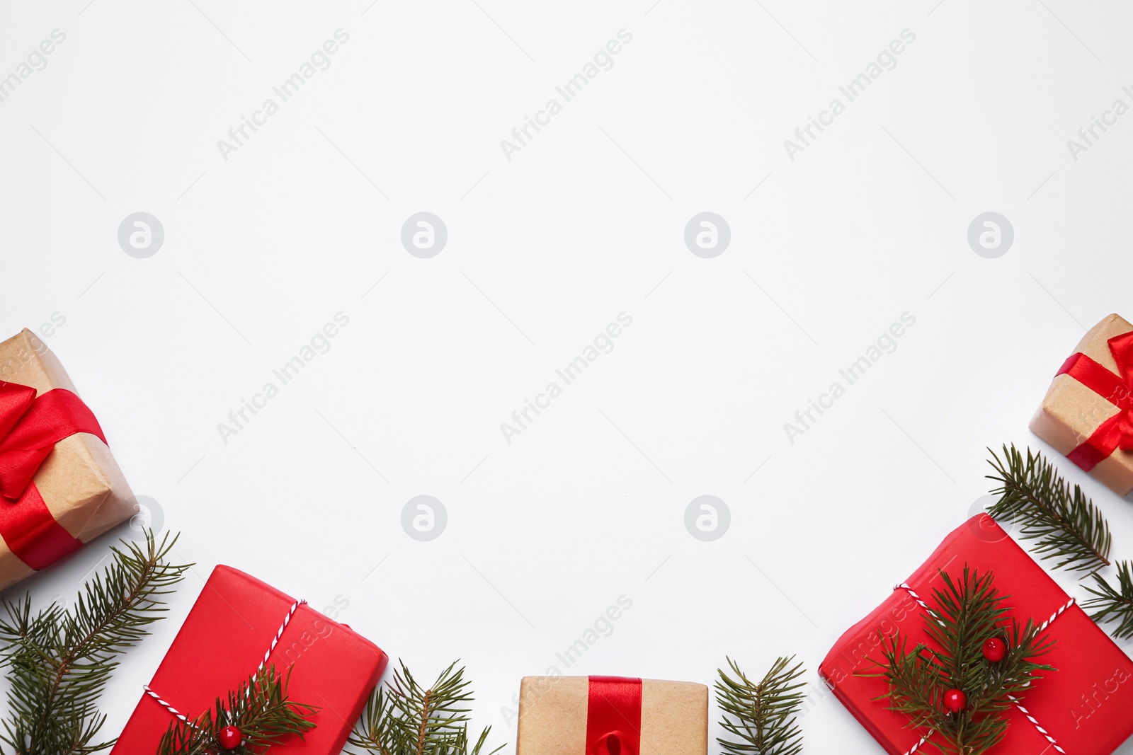 Photo of Flat lay composition with Christmas gifts on white background, space for text. Boxing day