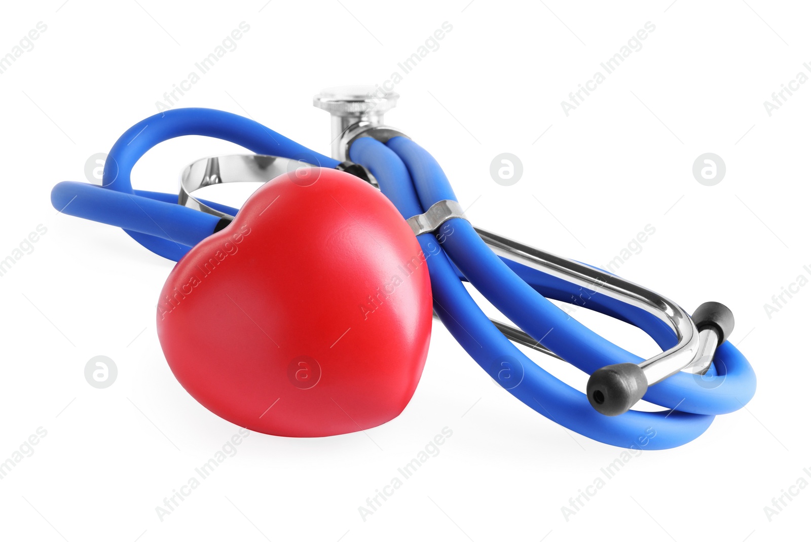 Photo of Stethoscope and red heart isolated on white