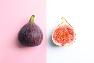 Photo of Fresh ripe figs on color background, top view