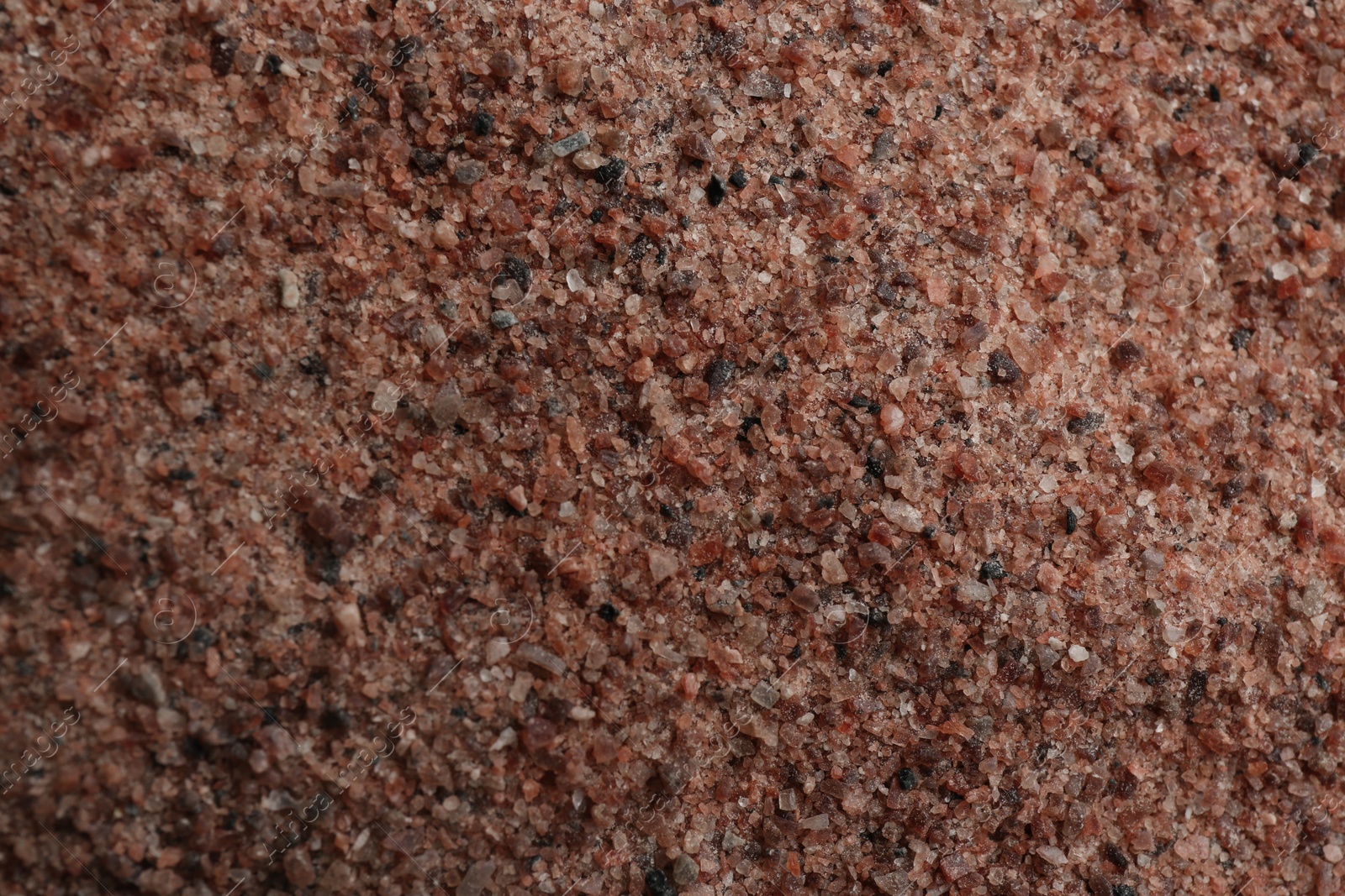 Photo of Pile of ground black salt as background, top view
