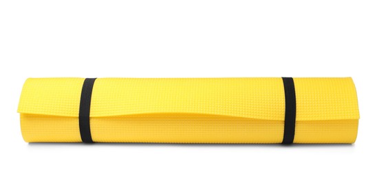 Yellow rolled mat isolated on white. Camping tourism equipment