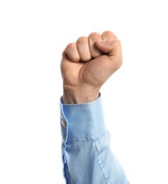 Young man showing clenched fist on white background