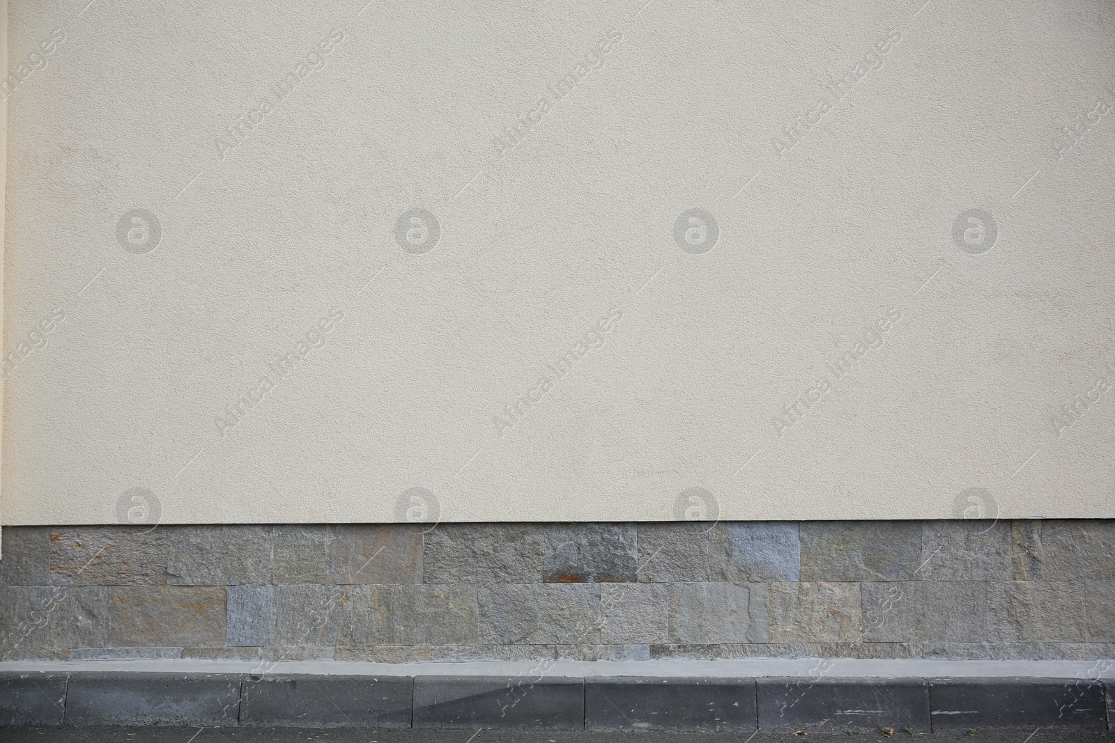 Photo of Beige wall of building outdoors. Exterior design