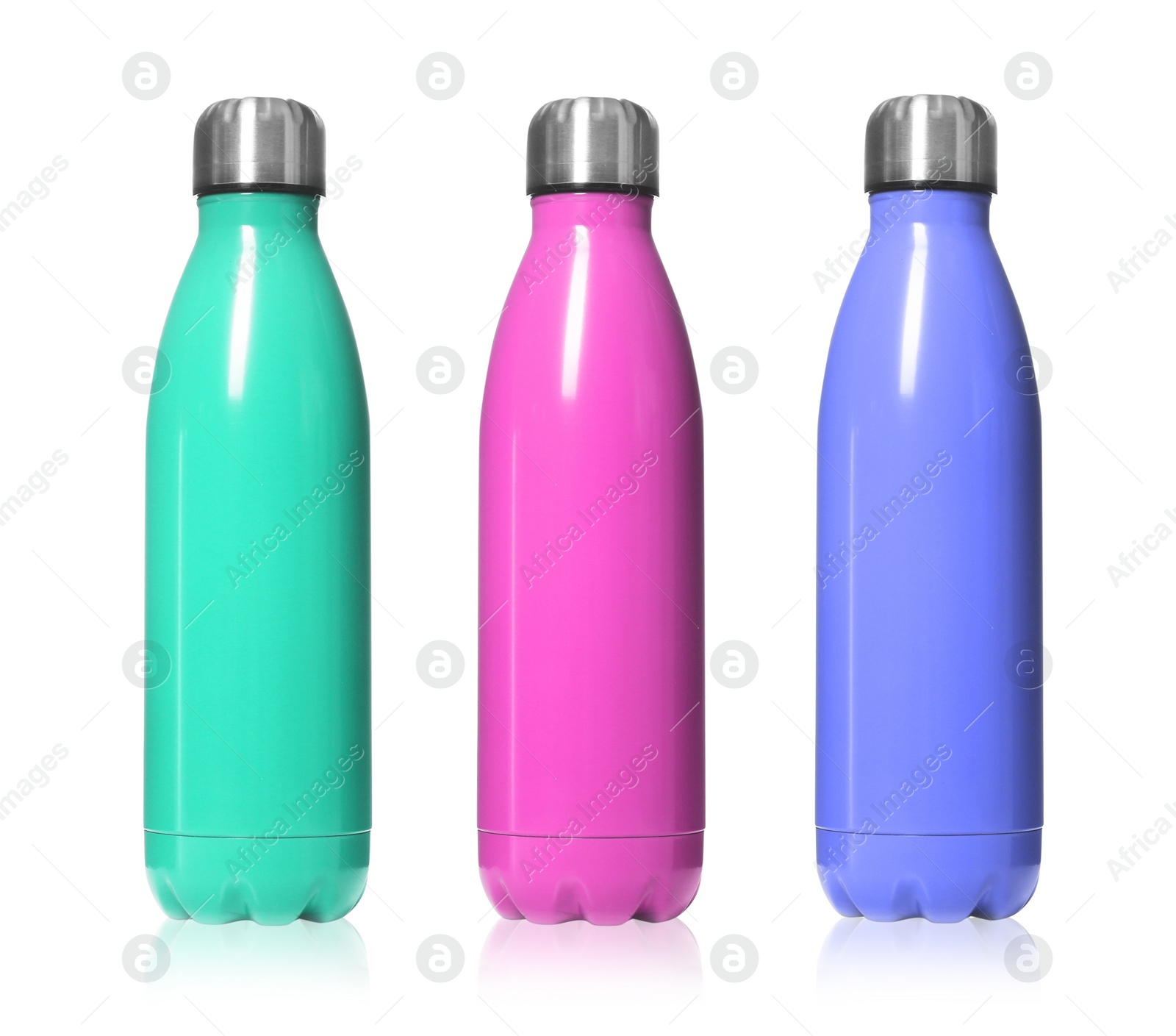 Image of Set of modern thermos bottles in different colors on white background 