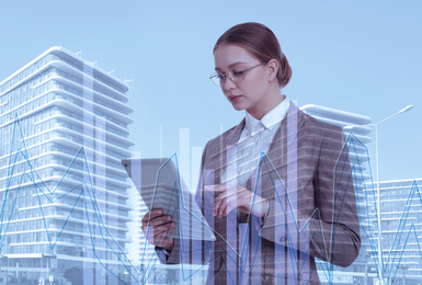 Multiple exposure of businesswoman, scheme and cityscape. Trade concept