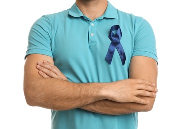 Man with blue ribbon on white background, closeup. Urology cancer awareness