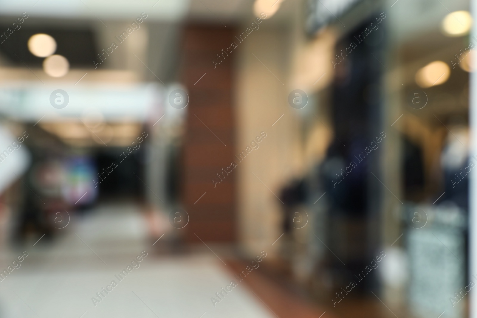 Photo of Blurred view of shopping mall interior. Bokeh effect