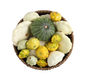 Photo of Fresh ripe pattypan squashes in wicker bowl on white background, top view