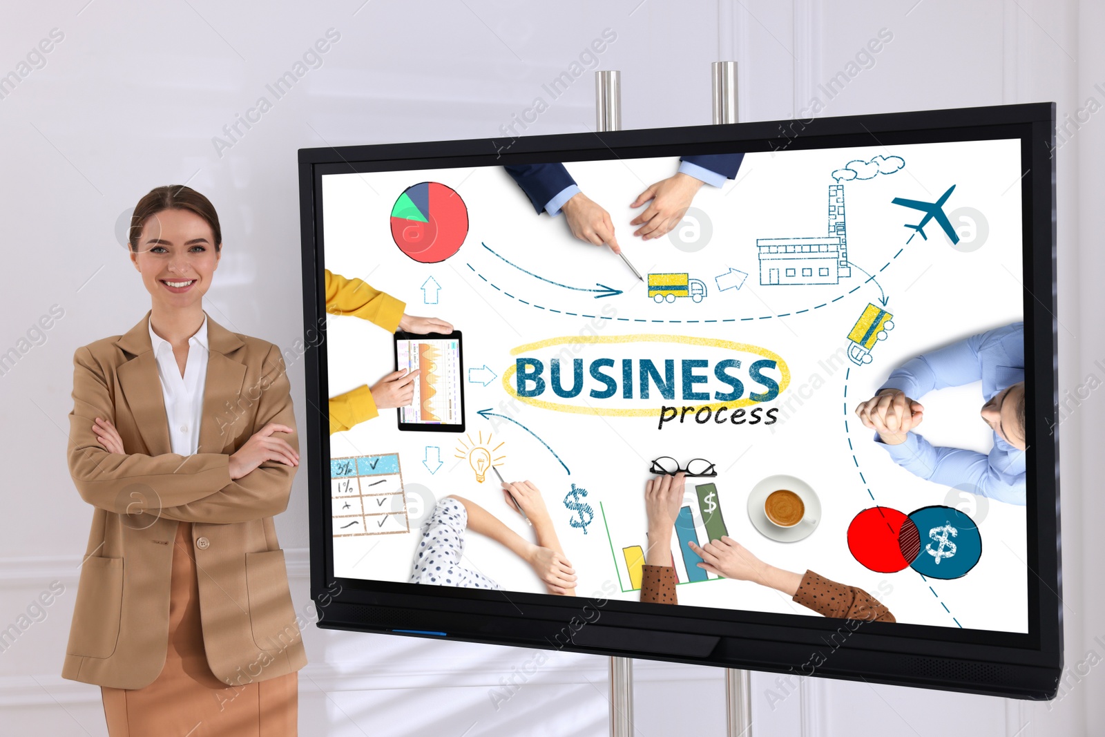 Photo of Business trainer near interactive board in meeting room