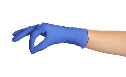 Photo of Woman in blue latex gloves holding something on white background, closeup of hand