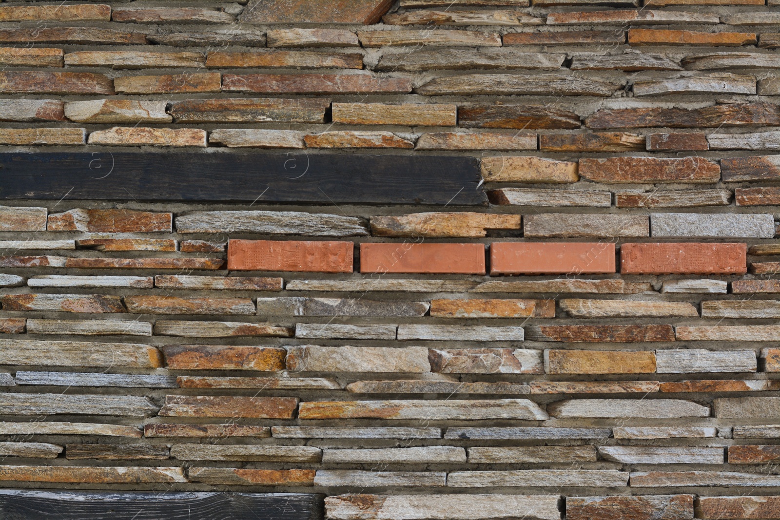 Photo of Texture of old stone wall as background, closeup