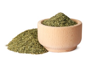 Photo of Wooden bowl with aromatic mate tea on white background