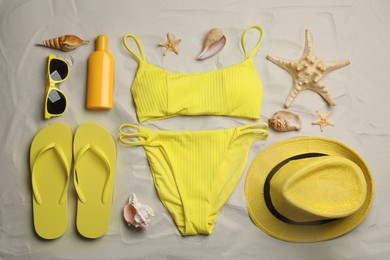 Photo of Flat lay composition with beach objects on sand