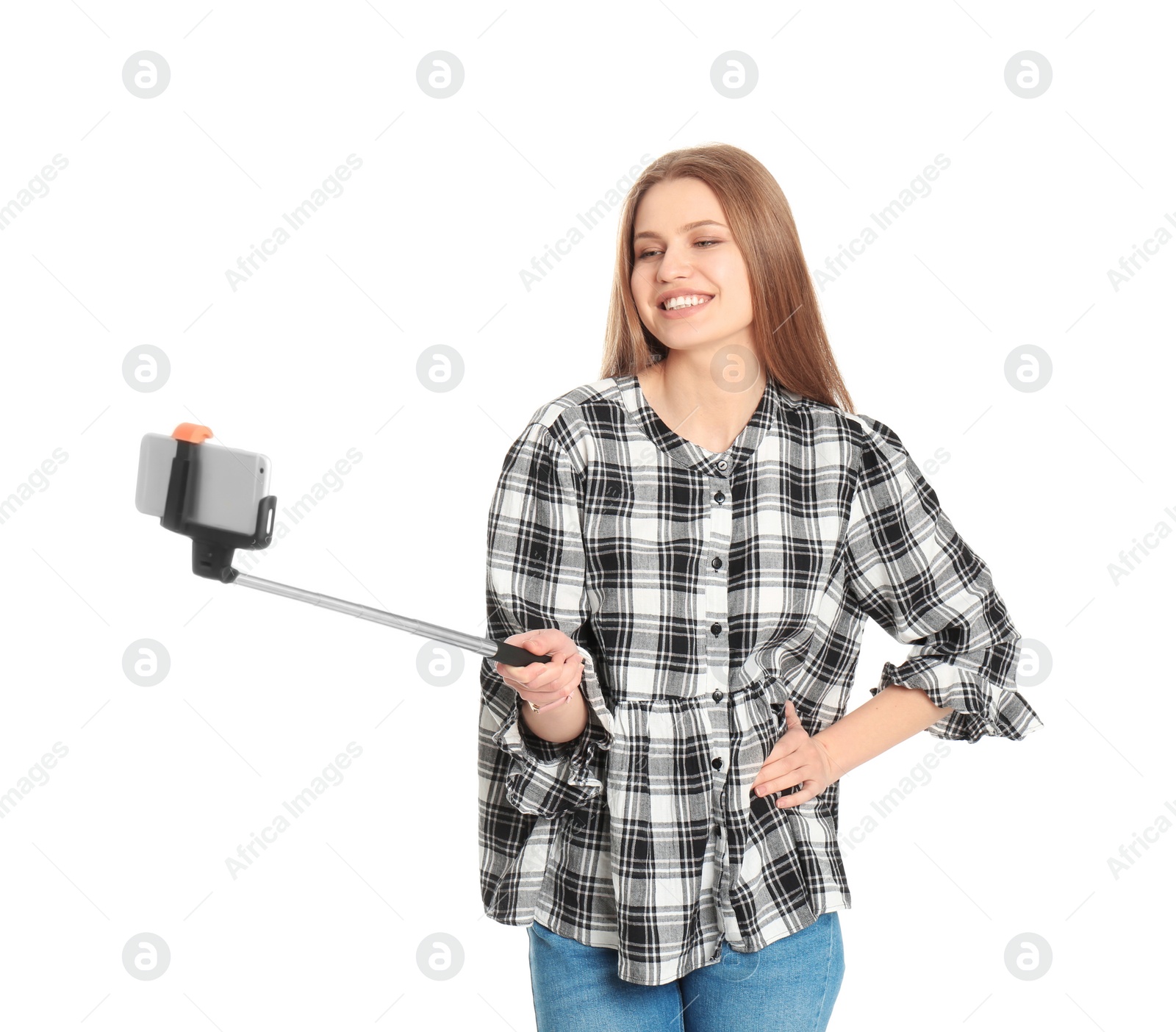 Photo of Young beautiful woman taking selfie against white background