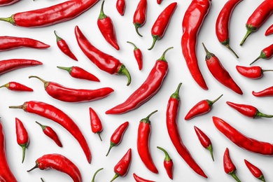 Photo of Flat lay composition with fresh chili peppers on white background