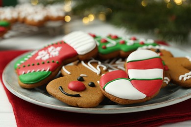 Tasty homemade Christmas cookies on white table, closeup