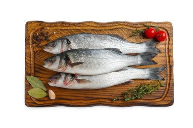 Board with fresh sea bass fish and ingredients on white background, top view