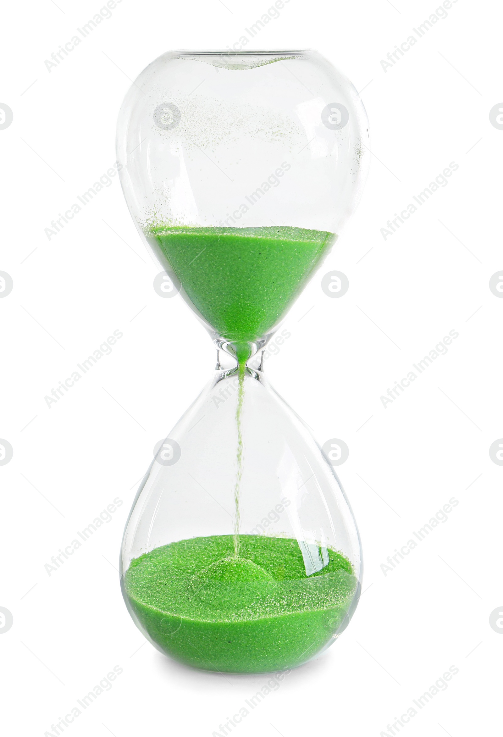 Photo of Hourglass with flowing sand on table against white background. Time management