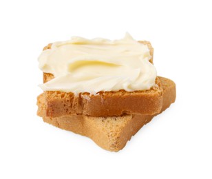 Photo of Slices of dry bread with butter isolated on white