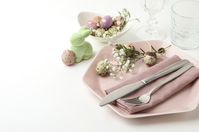 Photo of Festive Easter table setting with beautiful floral decor. Space for text