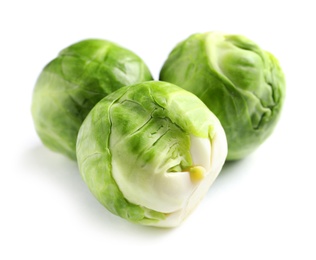 Fresh tasty Brussels sprouts on white background