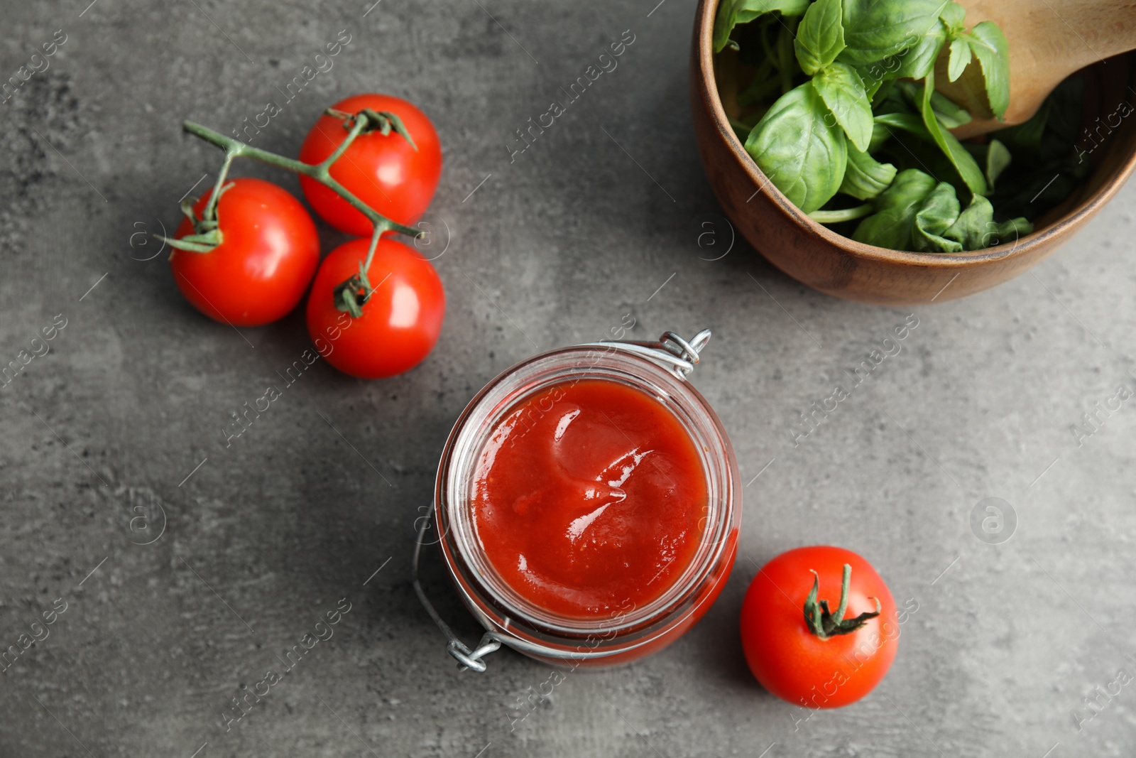 Photo of Composition with tasty homemade tomato sauce on table, top view