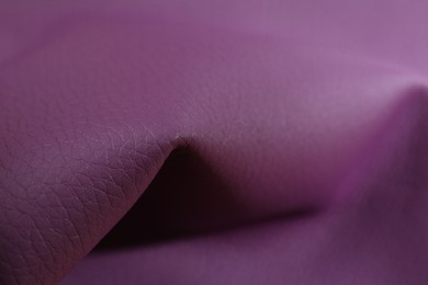 Photo of Beautiful purple leather as background, closeup view