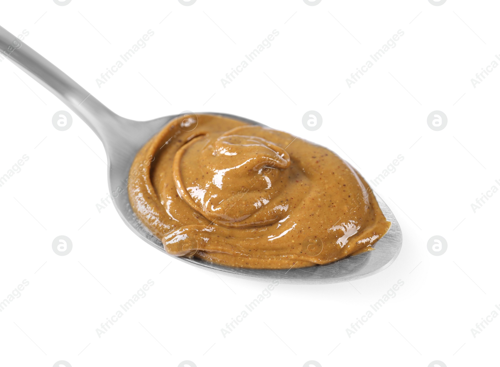 Photo of Delicious nut butter in spoon isolated on white