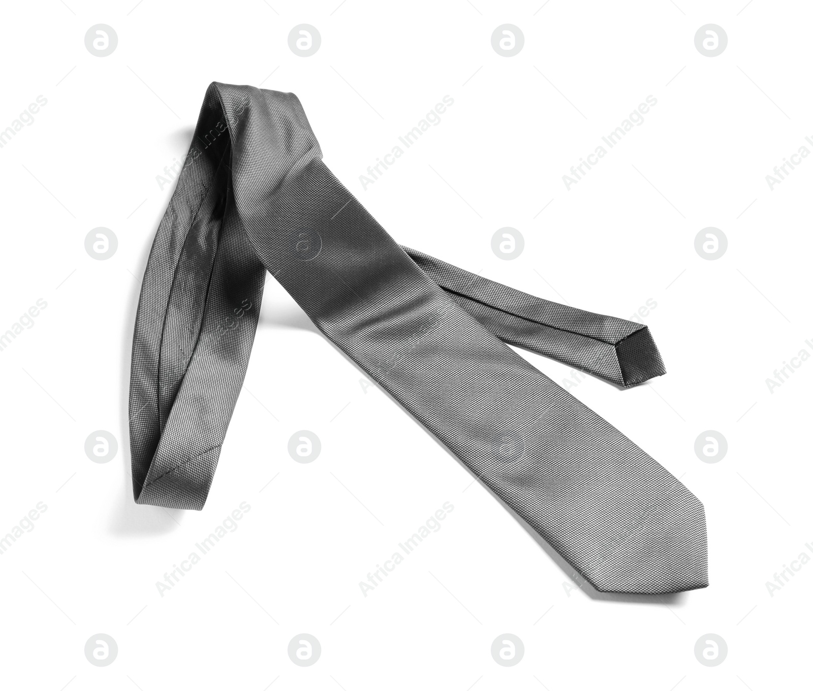 Photo of One grey necktie isolated on white, above view