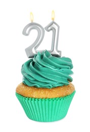 Photo of Delicious cupcake with number shaped candles on white background. Coming of age party - 21th birthday