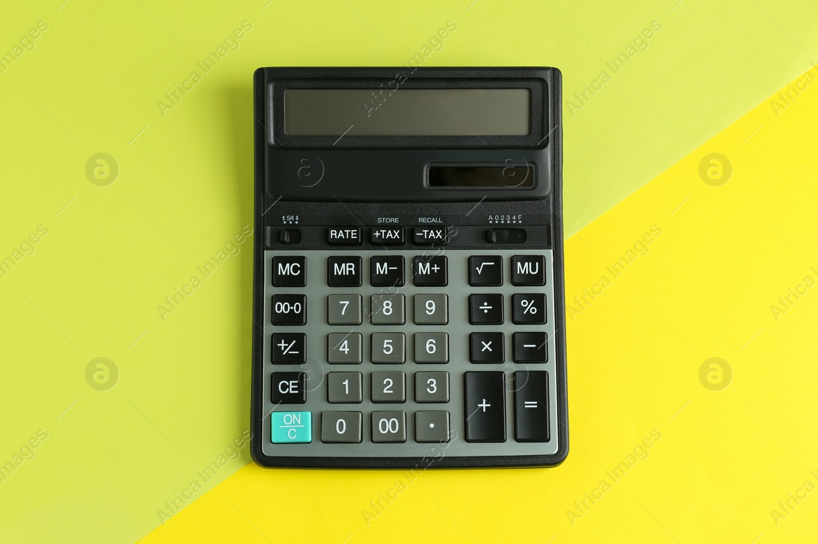 Photo of Modern calculator on color background, top view