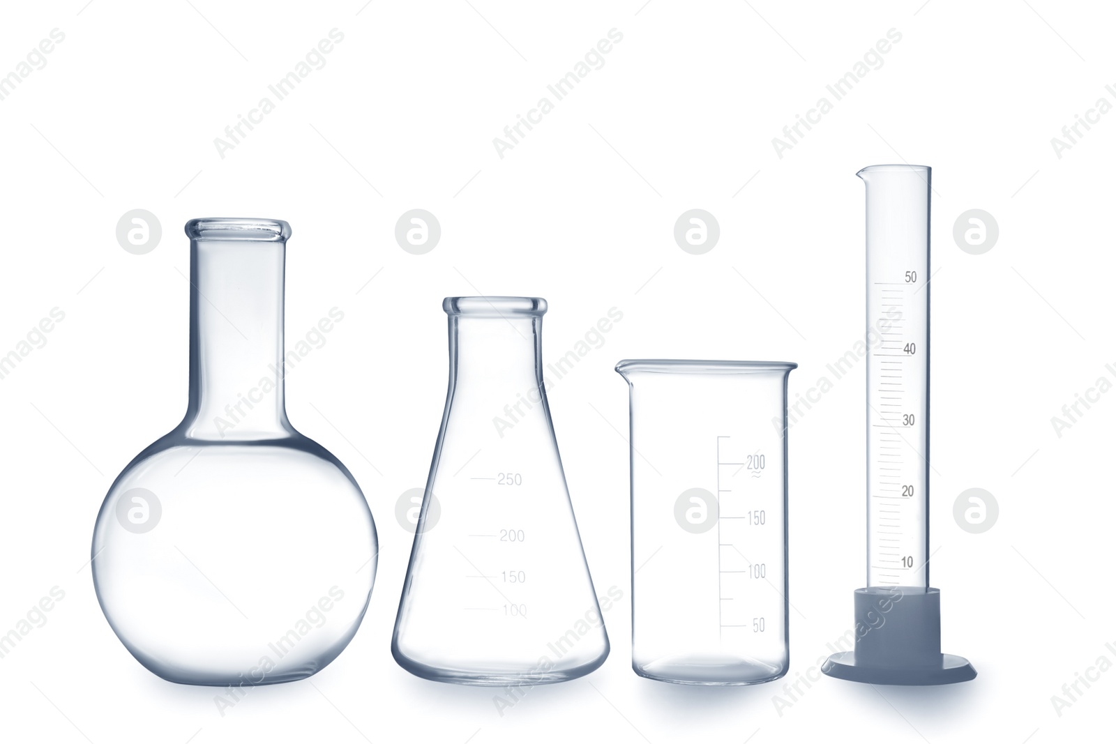 Photo of Empty clean laboratory glassware on white background