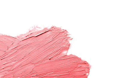 Photo of Strokes of lipstick on white background, top view