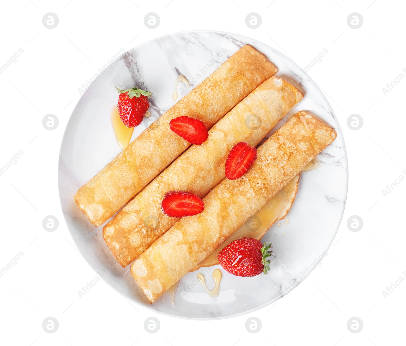 Photo of Plate with tasty thin pancakes and fresh berries on white background, top view