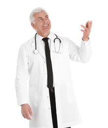 Photo of Portrait of male doctor with stethoscope isolated on white. Medical staff