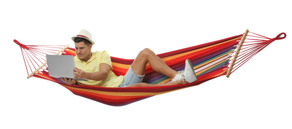 Photo of Man with laptop in hammock on white background