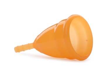 Photo of Orange menstrual cup isolated on white. Reusable feminine hygiene product