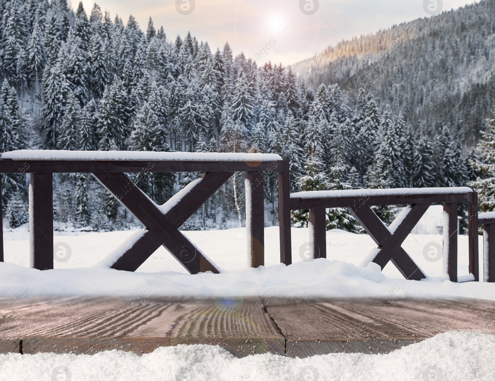 Image of Wooden surface and beautiful view of winter landscape 