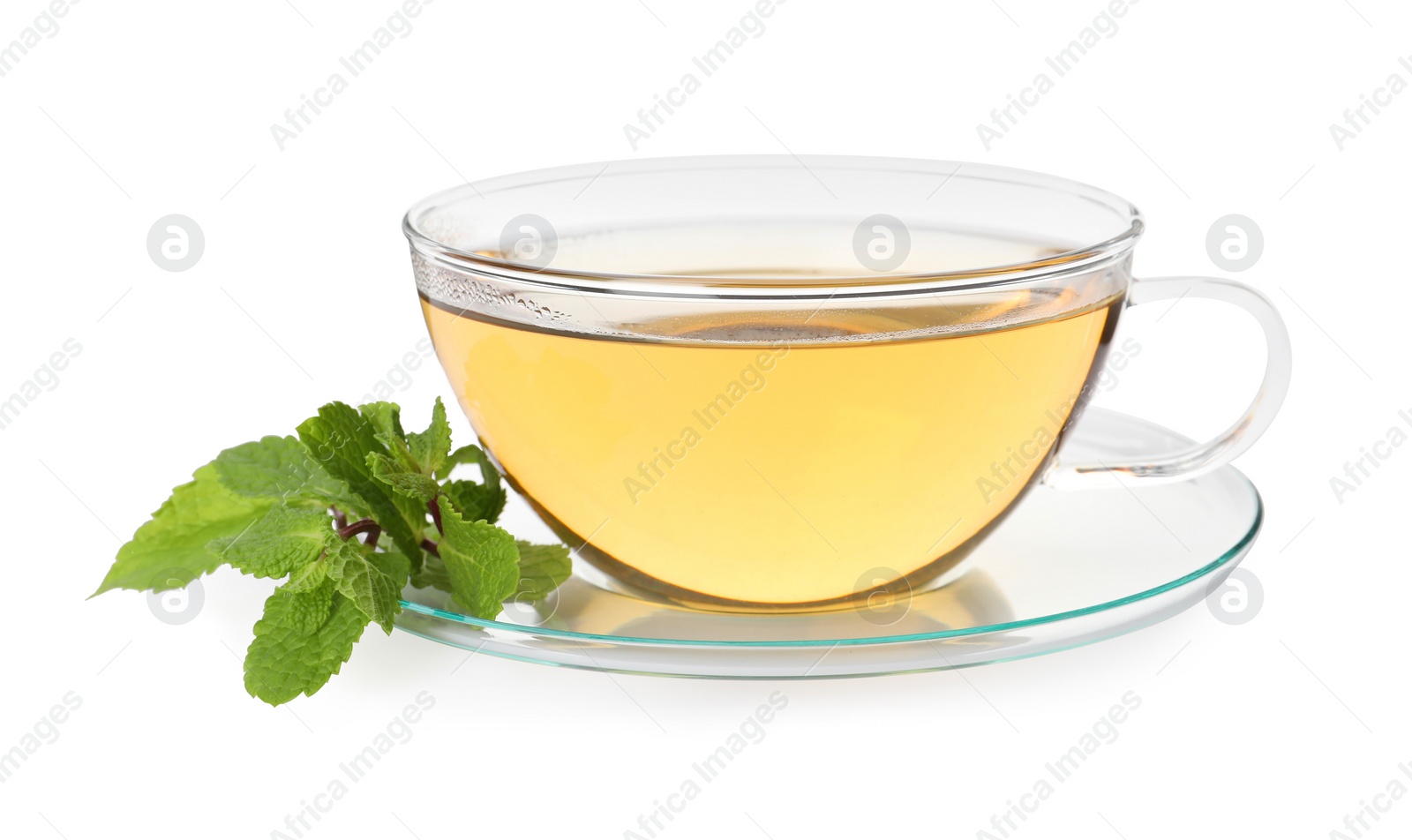 Photo of Cup of aromatic herbal tea and fresh mint isolated on white