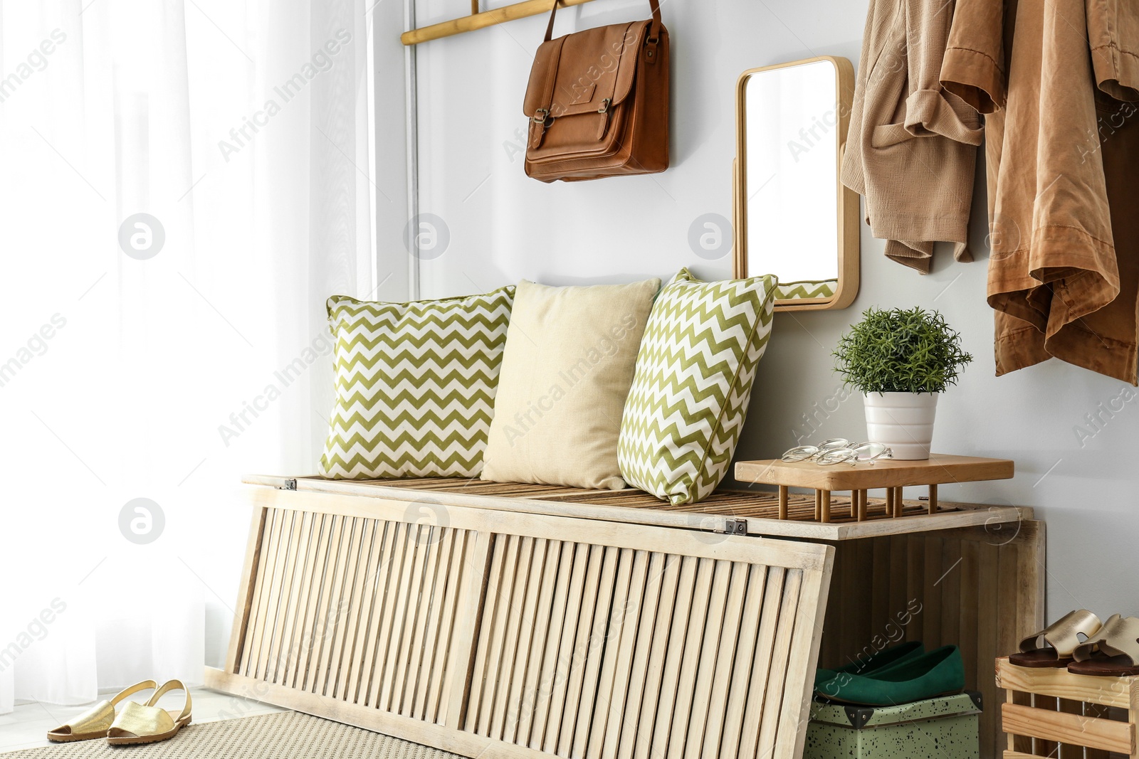 Photo of Cozy hallway interior with new stylish furniture