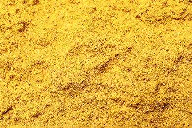 Photo of Dry curry powder as background, above view