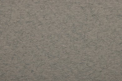 Texture of grey paper sheet as background, top view