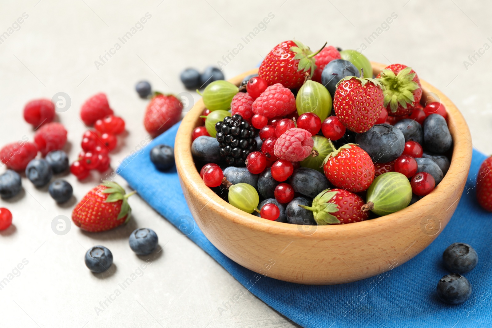 Photo of Mix of ripe berries on light table