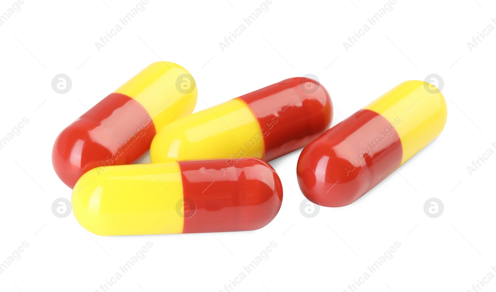 Photo of Many antibiotic pills isolated on white. Medicinal treatment