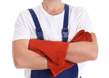 Male industrial worker in uniform on white background, closeup. Safety equipment