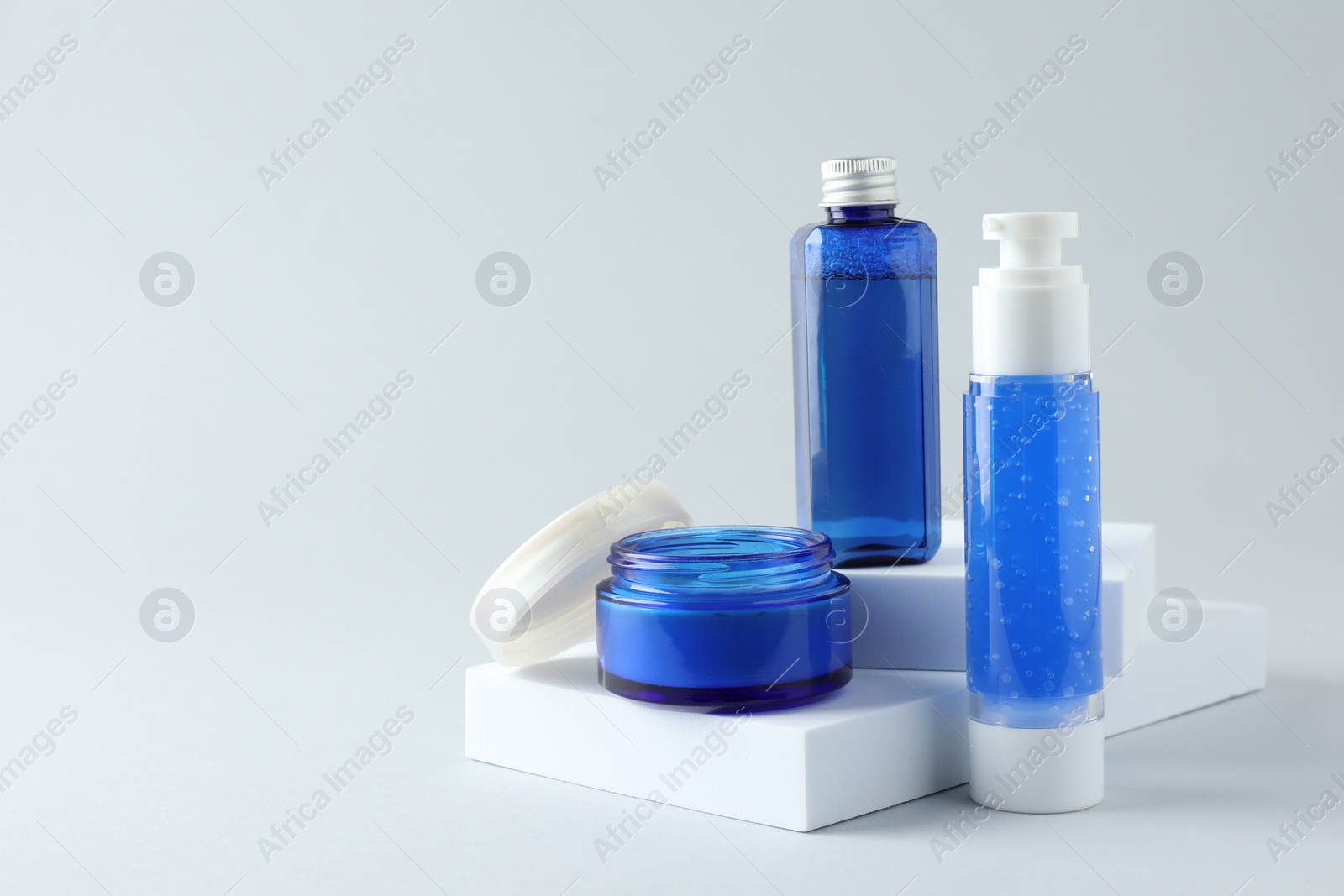 Photo of Set of luxury cosmetic products on white background. Space for text